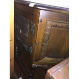 Oak side cabinet with carved panel Catalogue only, live bidding available via our website. Please