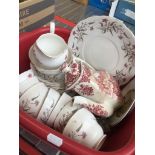 A red crate with Royal Standard china teaware and an old Wedgwood teapot Catalogue only, live