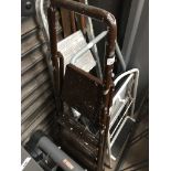 A pair of metal step ladders Catalogue only, live bidding available via our website. Please note