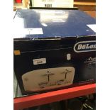 A boxed Delonghi toaster Catalogue only, live bidding available via our website. Please note we