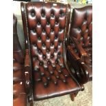 Brown leather buttoned X frame armchair Catalogue only, live bidding available via our website.