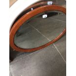 Oval framed mirror Catalogue only, live bidding available via our website. Please note we can only