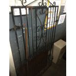 A wrought iron gate. Catalogue only, live bidding available via our website. Please note we can only