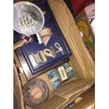 A box of navy related items to include ship in the bottle, glazed unit with ship and related