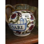 An Italian majolica jug entitled 'Castello De Cesari', length 19cm. Catalogue only, live bidding