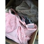 A box of ladies lingerie to include corset set, etc. Catalogue only, live bidding available via