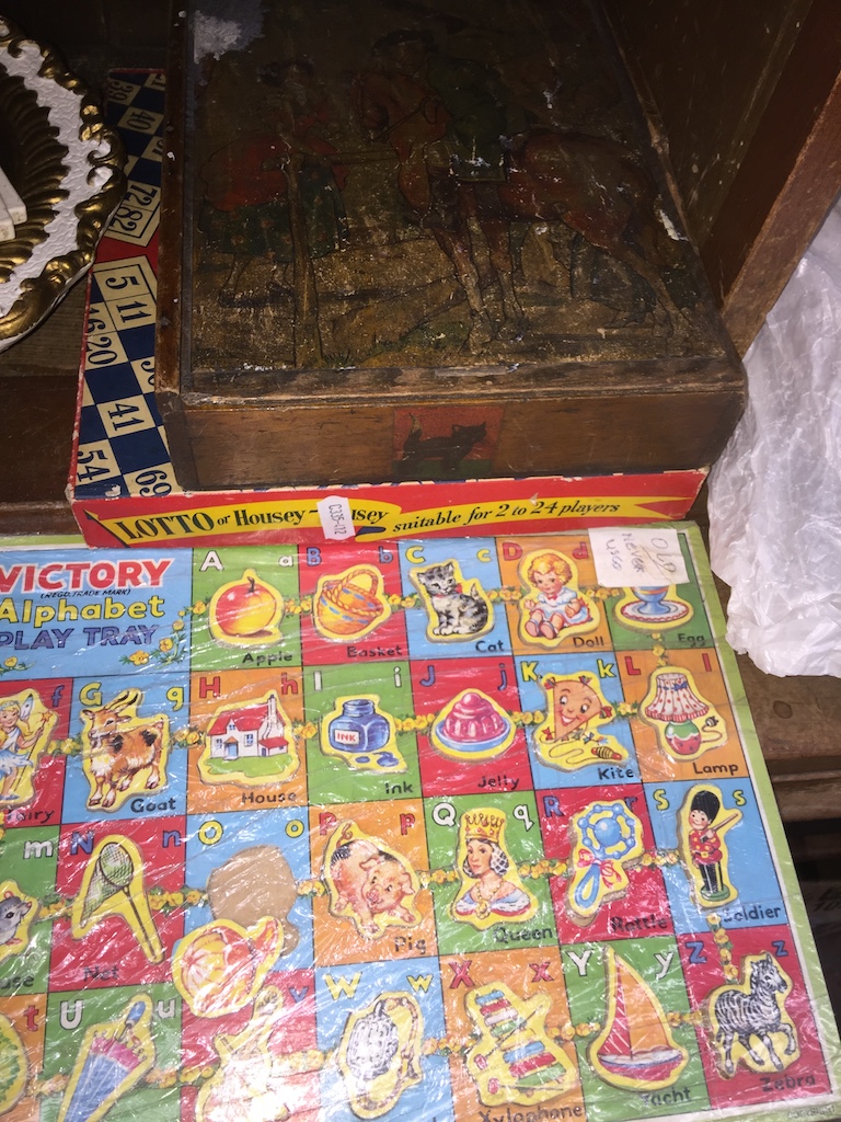 A vintage child's block jigsaw and other games. Catalogue only, live bidding available via our