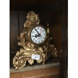 A converted to quartz gilded mantle clock Catalogue only, live bidding available via our website.