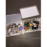 A box of costume jewellery brooches and a box of costume jewellery earrings. Catalogue only, live