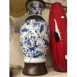 An oriental blue and white vase Catalogue only, live bidding available via our website. Please