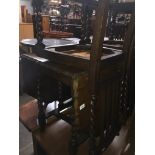 An oak drop leaf table with pie crust edge together with three chairs Catalogue only, live bidding