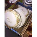 A part dinner service including plates, tureens etc Catalogue only, live bidding available via our