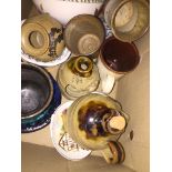 A box of mixed pottrey and glassware including Pretty Ugly Pottery, Wales, and Portmeirion Catalogue