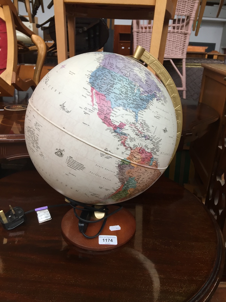 Electrified globe Catalogue only, live bidding available via our website. Please note we can only