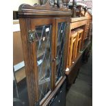 Leaded glass hanging corner cupboard Catalogue only, live bidding available via our website.