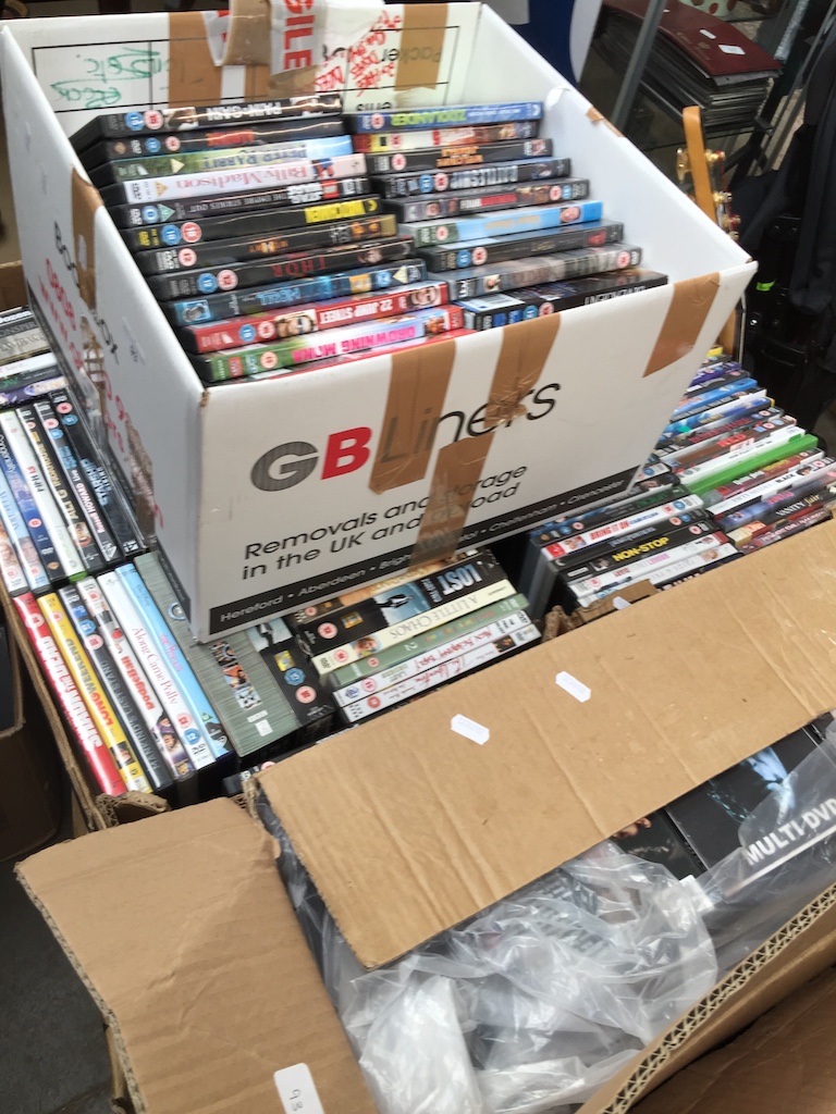 4 boxes of DVDs including box sets. Catalogue only, live bidding available via our website. Please