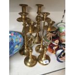 Three pairs of brass candlesticks Catalogue only, live bidding available via our website. Please