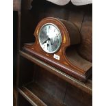 An inlaid mantle clock and a glazed display cabinet Catalogue only, live bidding available via our