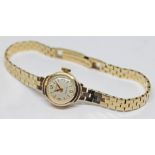 A hallmarked 9ct gold Rone ladies wristwatch with 17 jewel manual wind movement and integrated 9ct