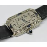 A French Art Deco diamond and sapphire set cocktail watch, case length 23mm, marked with an eagle'