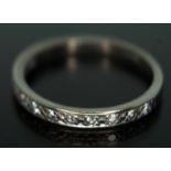 A diamond half eternity ring, marked '18ct', gross wt. 3.21g, size R. Condition - good, no damage/