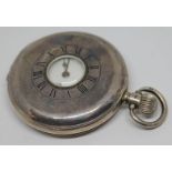 A Dimier Freres & Cie hallmarked silver half hunter pocket watch with white enamel dial, spade