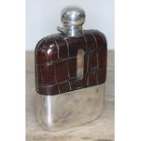 A silver plated croc leather bound glass hip flask, height 15cm.