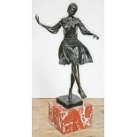 An Art Deco style bronze figure depicting a lady dancing on square marble base, signed 'Descomps'