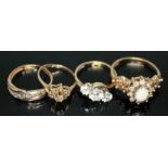 A group of four hallmarked 9ct gold rings, sizes I-R, gross wt. 8.70g.