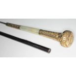 A sword stick with yellow metal and mother of pearl handle, blade length 68cm, total length 93cm.