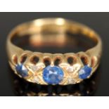 A late Edwardian 18ct gold diamond and sapphire ring, Birmingham 1912, gross wt. 3.76g, size L/M.