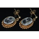 A pair of hallmarked 9ct gold aquamarine earrings, length 18mm, gross wt. 2.39g. Condition - good,