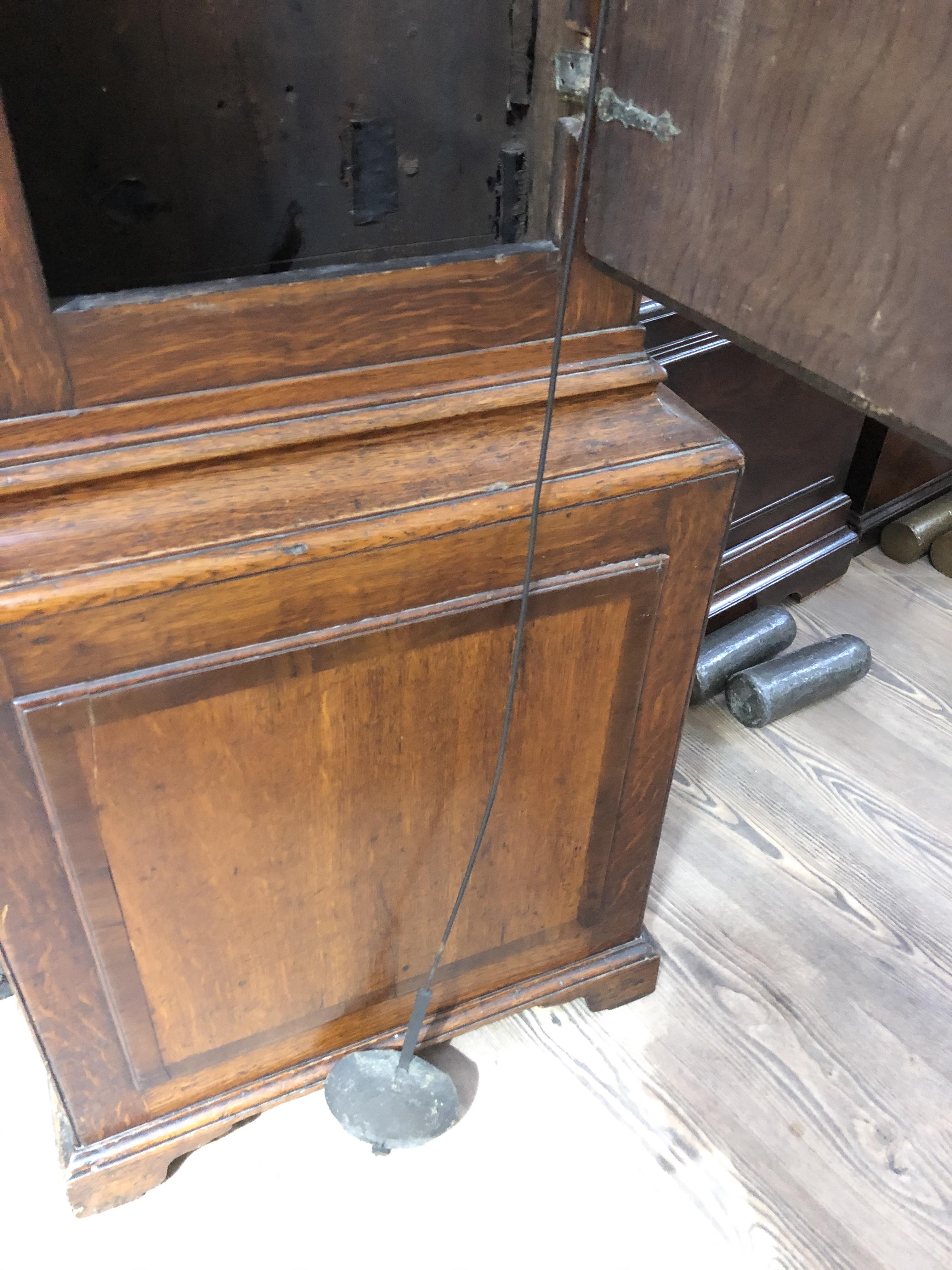 An 18th century oak eight day long case clock, four pillar brass movement striking on single bell, - Image 24 of 37