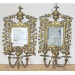 A pair of 19th century gilt bronze girandole mirrors and sconces, length 55cm, width 29cm.