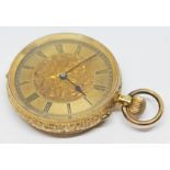A ladies pocket watch marked 18k with engraved central design to dial, Roman numerals and spade