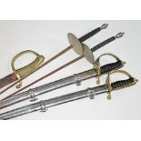 A collection of swords comprising two fencing swords, two reproduction swords with brass hilts and