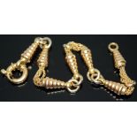 A 'bee hive' and chain linked bracelet with oversized ring bolt clasp, length 20cm, marked '750',