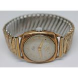 A vintage hallmarked 9ct gold Aria 15 jewel manual wind wristwatch with signed guilloche dial,