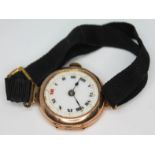 A ladies 9ct gold wristwatch with enamel dial, case diam. 25mm, with ribbon type strap, gross wt.