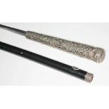 A sword stick with white metal top, blade length 53cm, total length 88cm. Condition: general surface