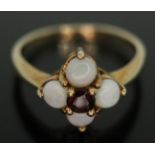 A hallmarked 9ct gold opal and garnet cluster ring, gross wt. 2.23g, size L. Condition - good, no