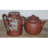 Two Chinese yixing teapots, heights 12cm and 14cm. Condition - minor nibble to rim on enamelled