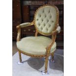 A 19th century French gilt wood salon armchair with pale green upholstery, height 97cm, width