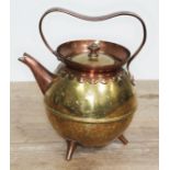 A copper and brass teapot designed by Christopher Dresser for Benham & Froud, unmarked, height 22cm.