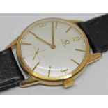 A vintage 1962 gold plated Omega wristwatch ref. 121001-62, with champagne signed dial, gold tone