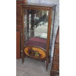 A French glazed display cabinet with gilt metal mounts, lower painted romantic scene on oval panel