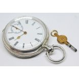 A silver cased pocket watch with white enamel dial, Roman numerals, spade hands in gold tone and