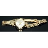 A hallmarked 9ct gold Avia wristwatch and hallmarked 9ct gold strap, gross wt. 11.31g.