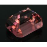 A 13.80 carat mixed emerald cut pink tourmaline.