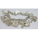 A hallmarked silver charm bracelet, length 16cm, wt. 85.60g.